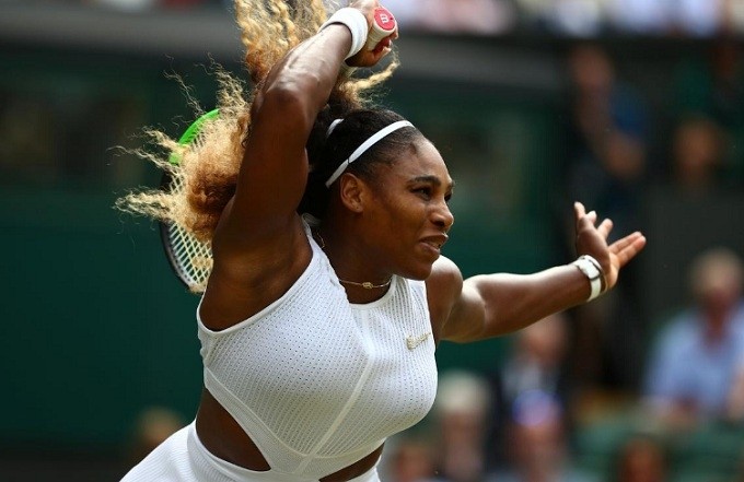 Tennis - Wimbledon - All England Lawn Tennis and Croquet Club, London, UK - July 9, 2019 Serena Williams of the US in action during her quarter final match against Alison Riske of the US. (Reuters)