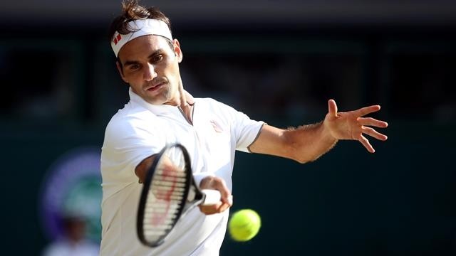 Switzerland's Roger Federer in action during his semi-final match against Spain's Rafael Nadal - Wimbledon - All England Lawn Tennis and Croquet Club, London, Britain - July 12, 2019 