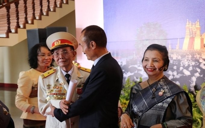 At the meeting between Vietnamese officials and relatives of late President Souphanouvong (Photo: NDO)