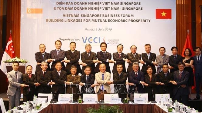 At the launch ceremony for the Vietnam-Singapore Business Council. (Photo: VNA)