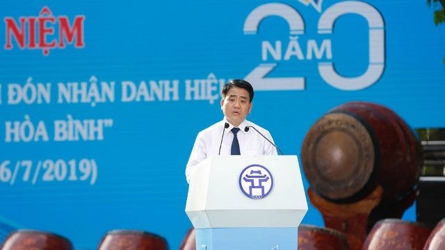 Chairman of the Hanoi municipal People’s Committee Nguyen Duc Chung speaks at the ceremony. (Photo: Ha Noi Moi)