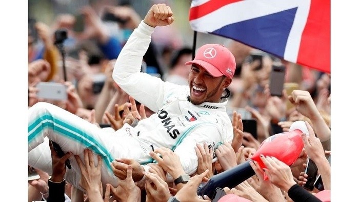 Mercedes' Lewis Hamilton celebrates with the crowd after winning the race - F1 British Grand Prix - Silverstone Circuit, Silverstone, Britain - July 14, 2019. (Photo: Reuters)