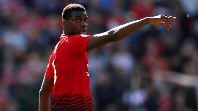 FILE PHOTO: Soccer Football - Premier League - Manchester United v Cardiff City - Old Trafford, Manchester, Britain - May 12, 2019 Manchester United's Paul Pogba gestures. Action Images via Reuters/Lee Smith