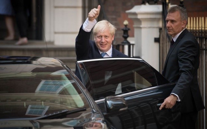 Newly elected leader of the Conservative Party Boris Johnson leaves Conservative Party HQ in London, after it was announced that he will become the next Prime Minister of the UK. (Photo: Getty)