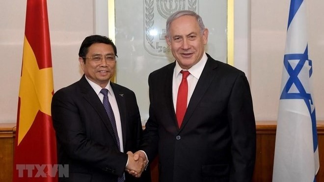 Politburo member, Secretary of the Party Central Committee and head of its Organisation Commission Pham Minh Chinh (L) and Chairman of Likud party and Prime Minister Bejamin Netanyahu (Photo: VNA)