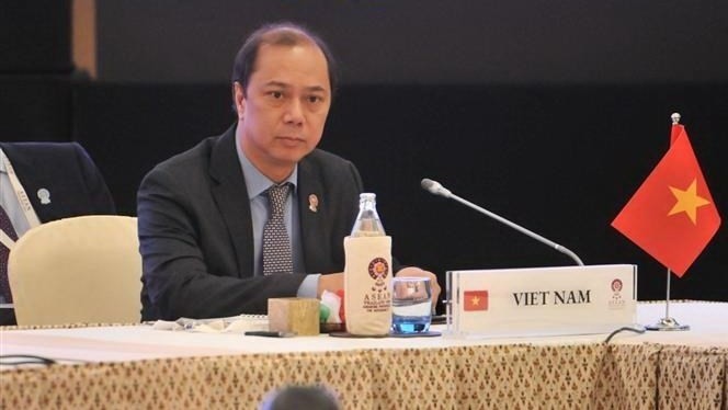 Deputy Minister of Foreign Affairs Nguyen Quoc Dung at the meetings (Photo: VNA)