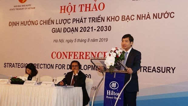 General Director of the Vietnam State Treasury Ta Anh Tuan speaking at the conference. (Photo: VNA)