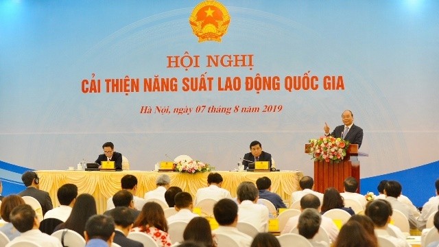 Prime Minister Nguyen Xuan Phuc speaking at a conference on improving national labour productivity (Photo: NDO/Tran Hai)