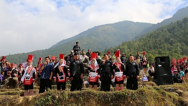 Dao Thanh Phan ethnic youngsters sing traditional songs during a traditional festival.