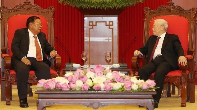 Party General Secretary and President Nguyen Phu Trong (R) and his Lao counterpart Bounnhang Volachith. (Photo: VNA)