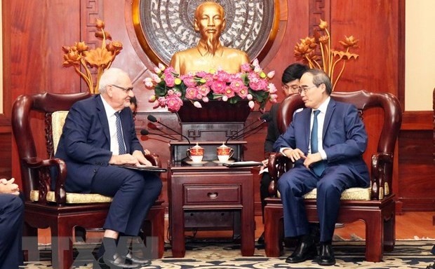 Secretary of the HCM City Party Committee Nguyen Thien Nhan (R) receives CEO of the International Finance Corporation Philippe Houerou. (Photo: VNA)