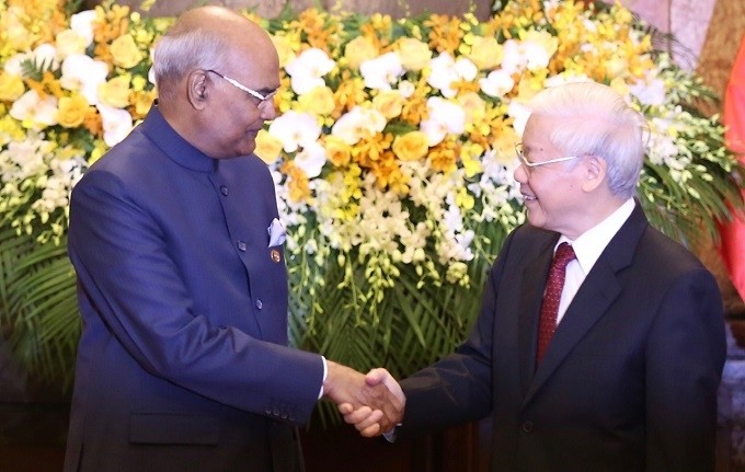 Party General Secretary and President Nguyen Phu Trong (R) receives Indian President Ram Nath Kovind during the latter's visit to Vietnam in November 2018. (Photo: VGP)