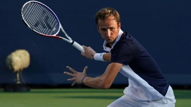 FILE PHOTO: Aug 16, 2019; Mason, OH, USA; Daniil Medvedev (RUS) returns a shot against Andrey Rublev (RUS) during the Western and Southern Open tennis tournament at Lindner Family Tennis Center. Mandatory Credit: Aaron Doster-USA TODAY Sports