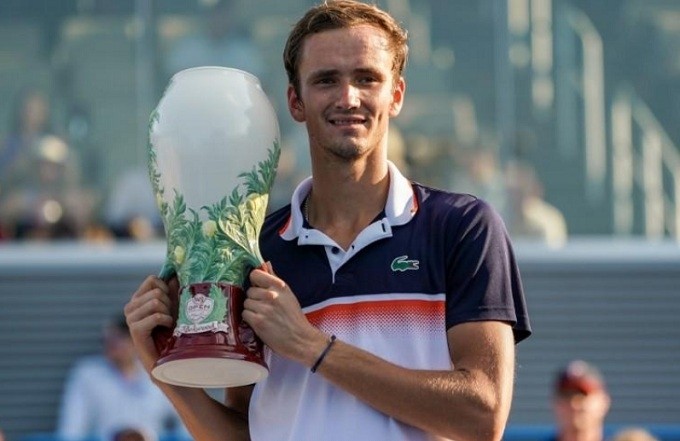 Aug 17, 2019; Mason, OH, USA; Daniil Medvedev (RUS) poses for a photo with the Rookwood Cup after defeating David Goffin (BEL) during the finals of the Western and Southern Open tennis tournament at Lindner Family Tennis Center. (Mandatory Credit: Aaron Doster-USA TODAY Sports)