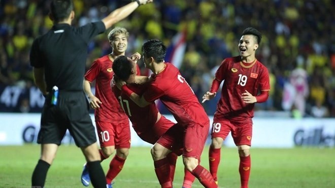 Members of Vietnam's national football team in a match of King's Cup 2019 in Thailand in June (Photo: VNA)