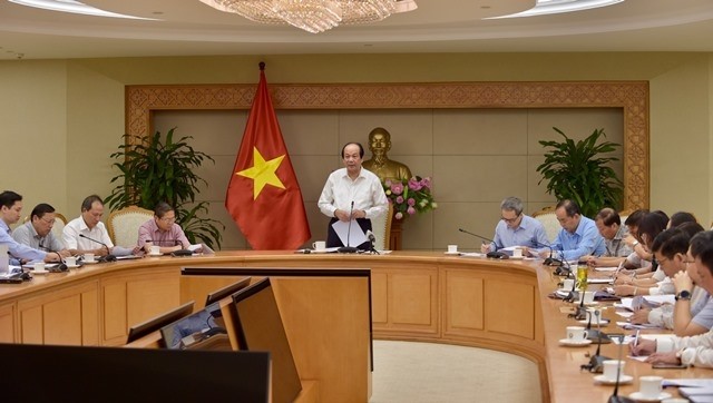 Minister and Chairman of the Government Office Mai Tien Dung speaks at the working session with representatives from 14 ministries on August 21. (Photo: VGP)