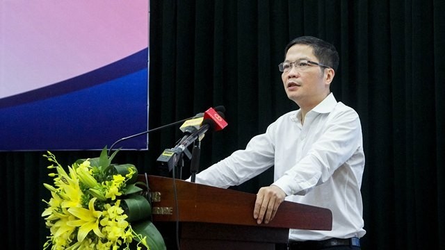 Minister of Industry and Trade Tran Tuan Anh speaks at the conference. (Photo: moit.gov.vn)