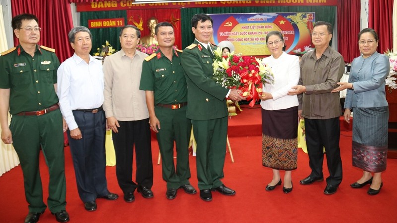 Chairwoman of the Lao National Assembly Pany Yathotou congratulates officers and soldiers of the Army Corp 11 on the occasion of the 74th National Day of the Socialist Republic of Vietnam.