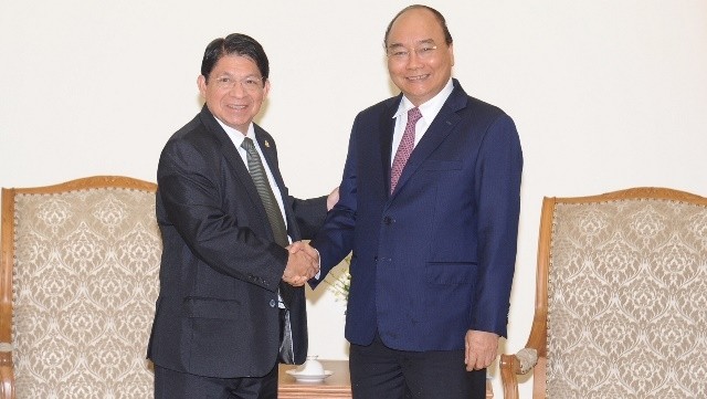 Prime Minister Nguyen Xuan Phuc (R) hosts Nicaraguan Foreign Minister Denis Moncada in Hanoi on September 6. (Photo: NDO/Tran Hai)