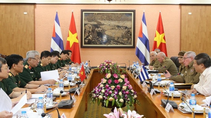 At the meeting, the two sides agreed to further step up the ties between the two ministries in a more practical and effective manner. (Photo: VNA)