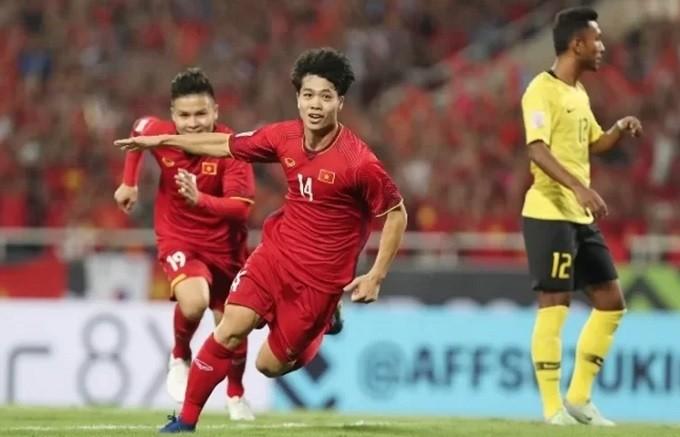 Vietnamese striker Nguyen Cong Phuong celebrates scoring against Malaysia in the group stage of the 2018 AFF Cup.