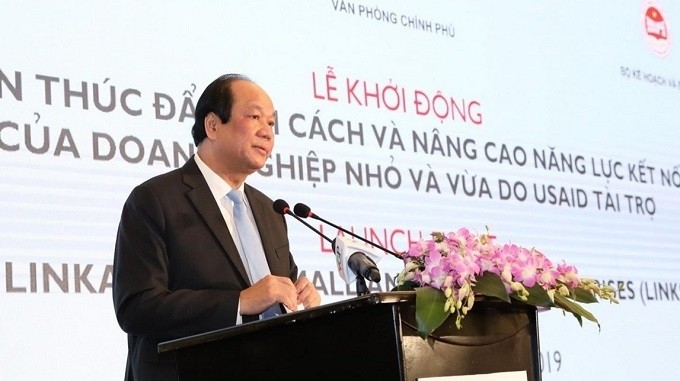 Minister-Chairman of the Government Office Mai Tien Dung speaks at the event. (Photo: VNA)