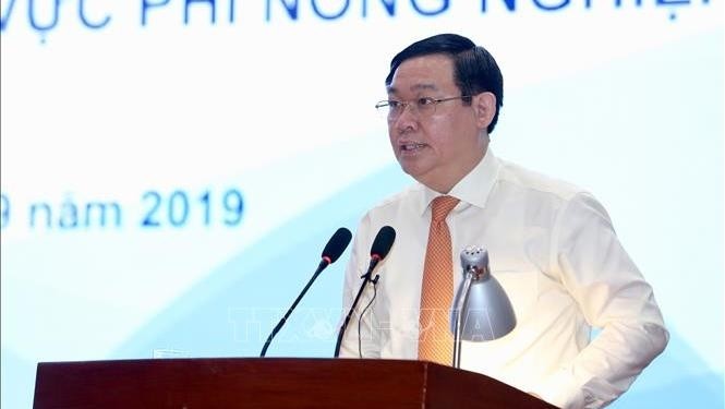 Deputy PM Vuong Dinh Hue speaking at the conference (Photo: VNA)