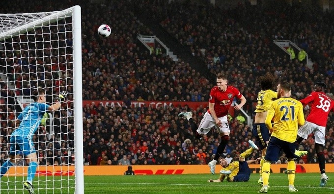 Soccer Football - Premier League - Manchester United v Arsenal - Old Trafford, Manchester, UK - September 30, 2019 Manchester United's Scott McTominay heads the ball at goal. (Reuters)