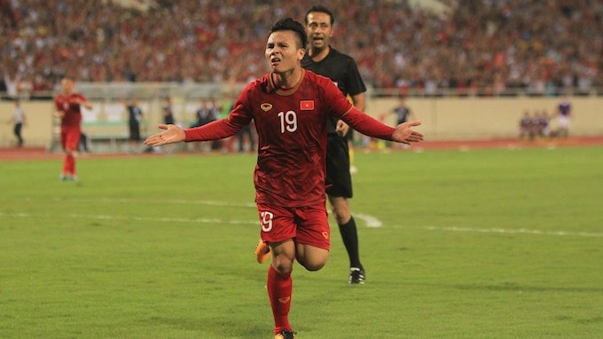Quang Hai celebrates after scoring a goal against Malaysia at My Dinh Stadium in Hanoi on October 10. (Photo: Vietnam Football Federation)