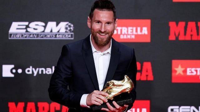 FC Barcelona's Lionel Messi receives his sixth Golden Shoe - Antiga Fabrica Estrella Damm, Barcelona, Spain - October 16, 2019 FC Barcelona's Lionel Messi poses with the golden shoe during the ceremony. (Photo: Reuters)