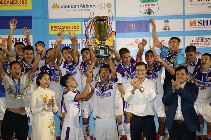 Hanoi FC celebrate their fifth national U21 championship trophy.