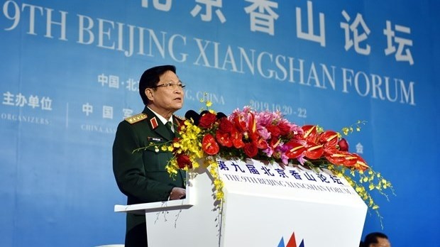 General Ngo Xuan Lich, Politburo member, Vice Secretary of the Central Military Commission and Minister of National Defence of Vietnam, delivers a speech at the 9th Beijing Xiangshan Forum (Photo: VNA)