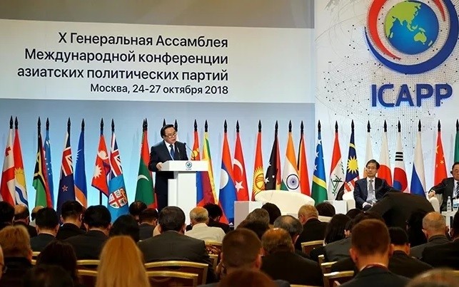 Hoang Binh Quan, Head of the Party Central Committee’s Commission for External Relations, speaks at the 10th General Assembly of the International Conference of Asian Political Parties in Russia in 2018.