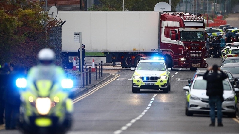 Police move the lorry container where bodies were discovered in Grays, Essex, UK. (Photo: Reuters)