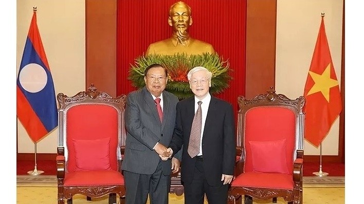 Party General Secretary and President Nguyen Phu Trong (R) and his Lao counterpart Bounnhang Vorachith (Photo: VNA)