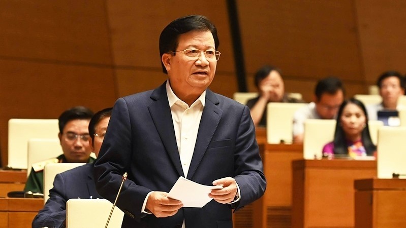 Deputy PM Trinh Dinh Dung at the National Assembly’s working session on November 7. (Photo: NDO)