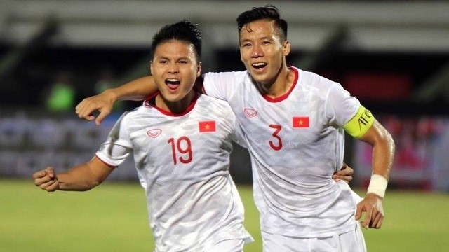 Quang Hai (L) has played a key role in both the U22 and the senior squads. (Photo: Vietnam Football Federation)