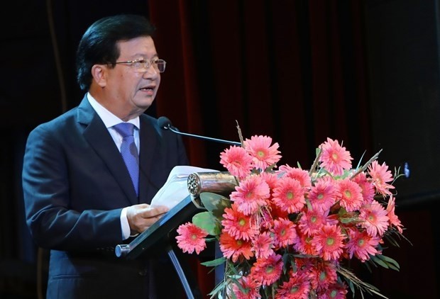 Deputy Prime Minister Trinh Dinh Dung at the working session (Photo: VNA) 