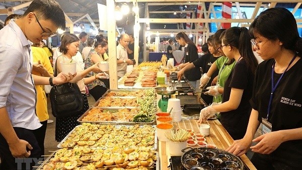 Visitors at the 14th Ho Chi Minh City International Food Festival (Photo: VNA)