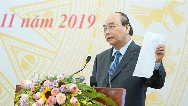 Prime Minister Nguyen Xuan Phuc speaks at the conference to review the five-year implementation of the Politburo’s Resolution No. 30-NQ/TW on improving the efficiency of agro-forestry companies, Hanoi, November 18, 2019. (Photo: VGP)