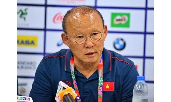 Vietnam head coach Park Hang-seo speaks at a press conference after their match against Laos U22s.