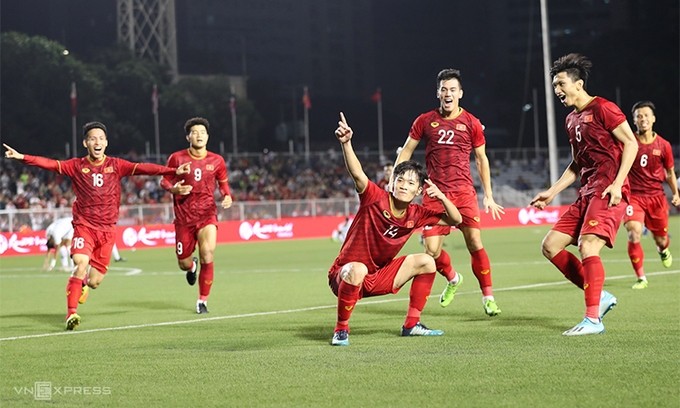 Nguyen Hoang Duc (no. 14) celebrates scoring a late goal to seal a nail-biting win for Vietnam U22s. (Photo: Vnexpress)