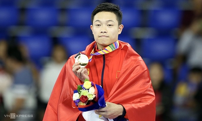 Vietnamese gymnast Dang Nam defends his SEA Games gold medal in the men's rings. (Photo: Vnexpress)