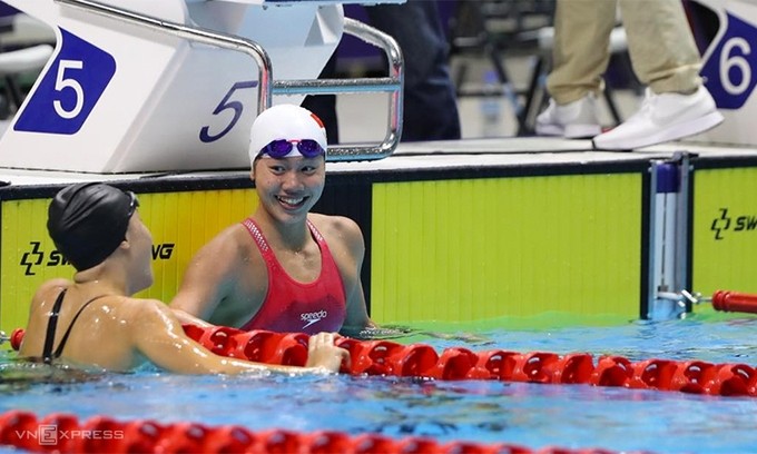 Swimmer Nguyen Thi Anh Vien smiles brightly after winning the 400m freestyle gold medal. (Photo: Vnexpress)