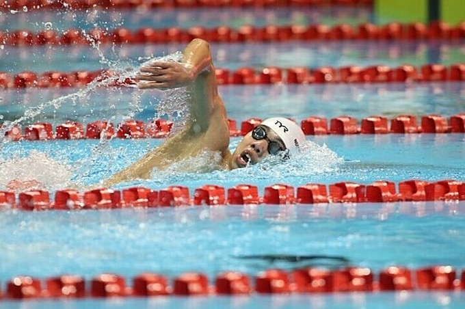 Swimmer Nguyen Huy Hoang competes in the men's 1,500m freestyle final on Thursday afternoon.