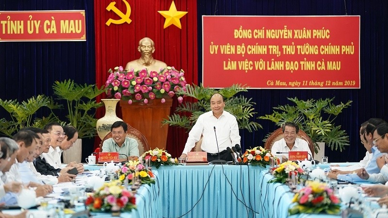 Prime Minister Nguyen Xuan Phuc and Ca Mau leaders (Photo: VGP)