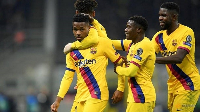 Soccer Football - Champions League - Group F - Inter Milan v FC Barcelona - San Siro, Milan, Italy - December 10, 2019 Barcelona's Anssumane Fati celebrates scoring their second goal with teammates. (Reuters)