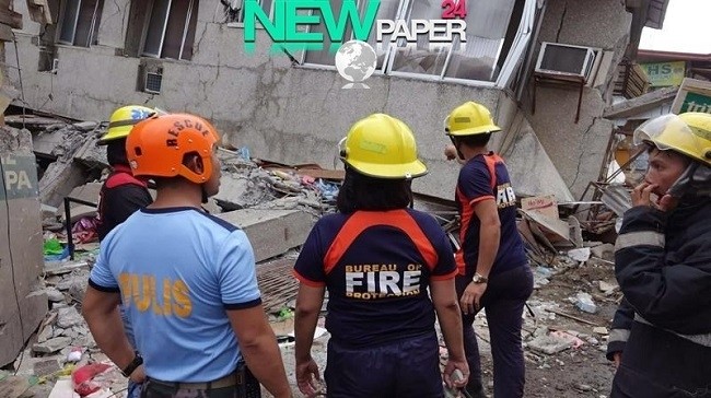 Philippines hunts for survivors after quake levels trade building
