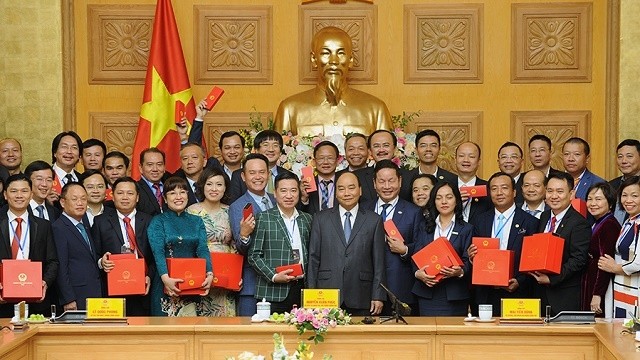 Prime Minister Nguyen Xuan Phuc and delegates at the event (Photo: NDO/Tran Hai)