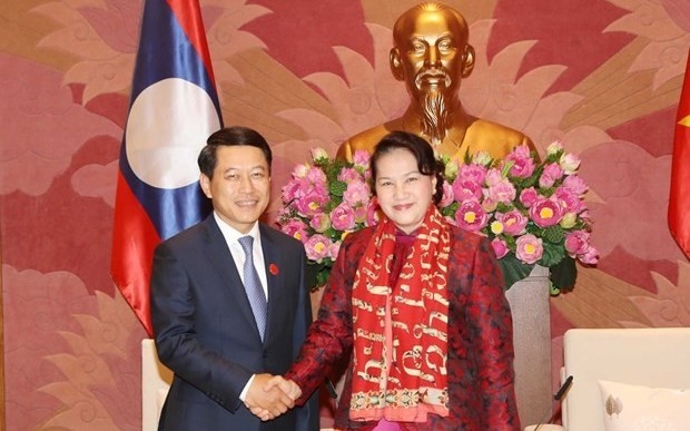 Vietnamese National Assembly Chairwoman Nguyen Thi Kim Ngan (R) and Lao Foreign Minister Saleumxay Kommasith (Photo: VNA)
